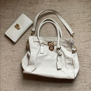 Michael Kors purse with matching wallet.